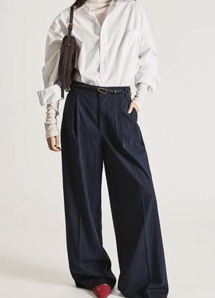 Широкі штани із защіпами від бренду zara