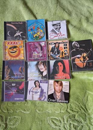 Диски двд и cd. музыка. все рабочие. русская, украинская и зарубежная музыка. цена за один диск 50 грн. за все 1400 грн.