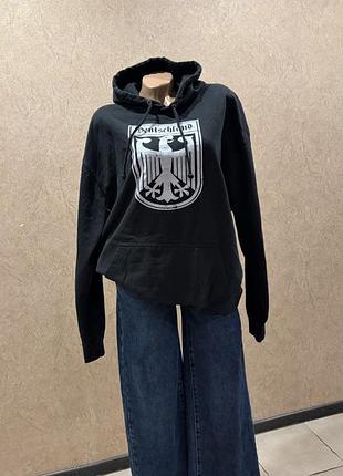 Чорне тепле худі кенгуру just hoods з принтом deutschland, розмір xl- (на бірці xxl)