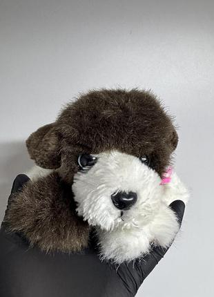 Плюшеву іграшку серії puppy puppy puppies від компанії tyco (1993 рік випуску), зокрема на модель із коричнево-білим