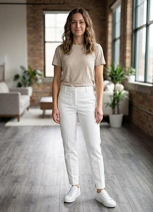 Елегантні білі завужені штани zara (розмір s)