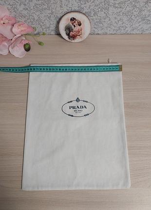 Белый с синей надписью петлик grapha. 3