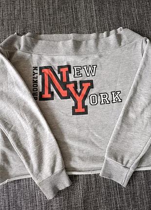 Кофта оверсайз для дівчаток, з відкритими плечами, сіра з написом new york