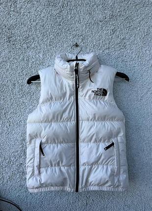 Пухова жилетка the north face