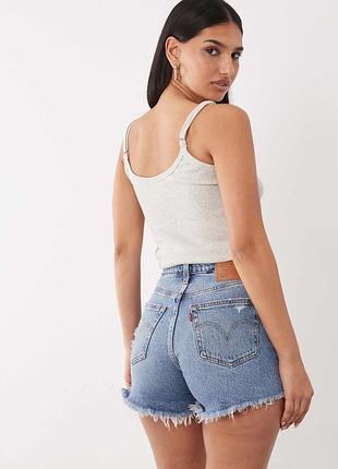 Джинсові шорти з високою посадкою та необробленим краєм моделей levi's 501