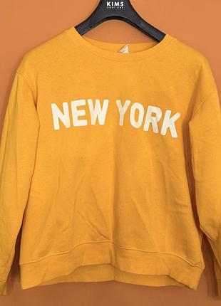 Жовтий світшот з написом new york
