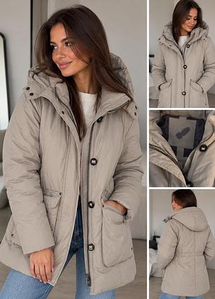 Зимова куртка the outerwear жіноча бежева з капюшоном