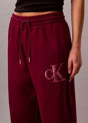 Штани широкі флісові з монограмою з паєтками calvin klein