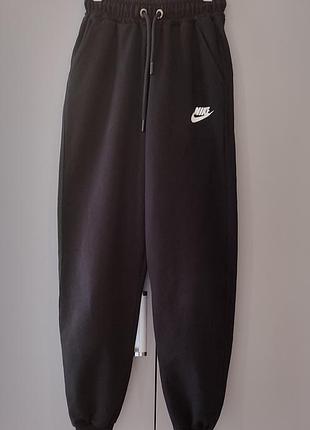 Спортивні штани для хлопця nike чорні 146-152 см