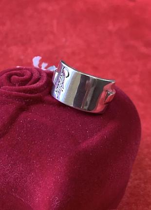 Срібна каблучка з пластиною та написом cartier