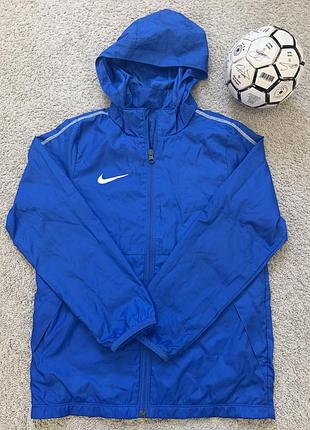 Футбольна спортивна вітровка- дощовик nike dry park 18 rain jacket у насиченому синьому кольорі для хлопчика на 10-12 р