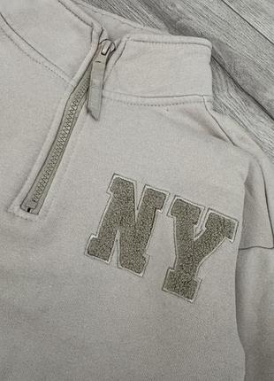 Кофта бежева з написом ny 2