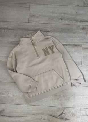 Кофта бежева з написом ny