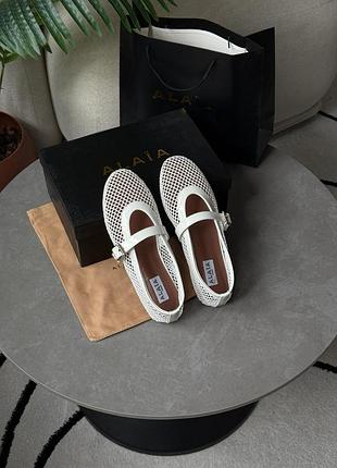 Alaïa ballet flats in fishnet optical white 2