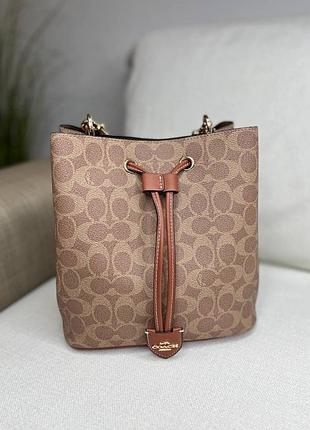 Сумка жіноча coach через плече бежева з монограмою