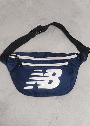 Оригінальна синя поясна сумка new balance opp core large waist bag