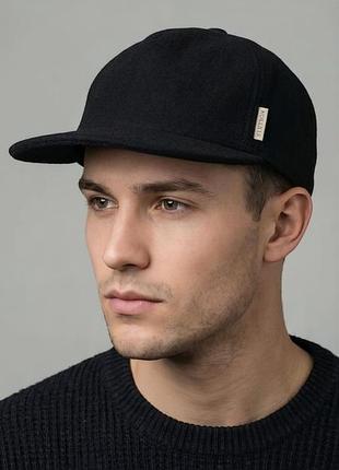 Высококачественная шерстяная  кепка stetson с ушными клапанами.