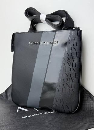 Чоловіча сумка armani exchange monogram and stripe flat shoulder bag