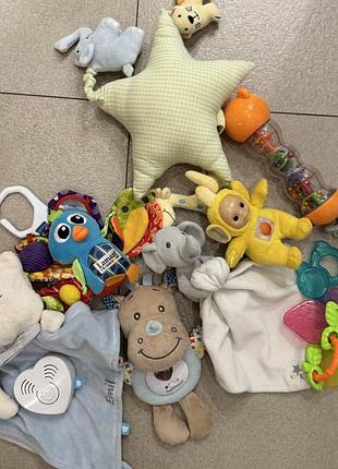 Іграшки для малюків музичні розвивальні різнокольорові текстиль пластик