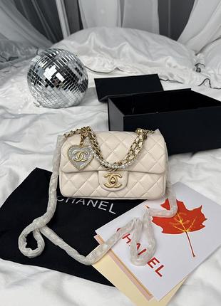Chanel classic flap top handle cream with gold