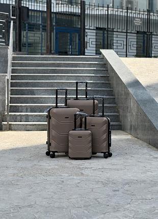 Комплект чемоданов коричневый из поликарбоната на колесах 4 в 1 mini, s, m, l арт wings 148 (кор) all