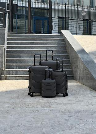 Комплект чемоданов черный из поликарбоната на колесах 4 в 1 mini, s, m, l арт wings 148 (чер) all
