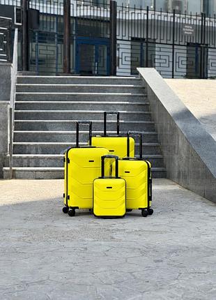 Комплект чемоданов желтый из поликарбоната на колесах 4 в 1 mini, s, m, l арт wings 148 (жел) all