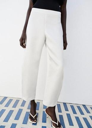 Білі брюки zara
