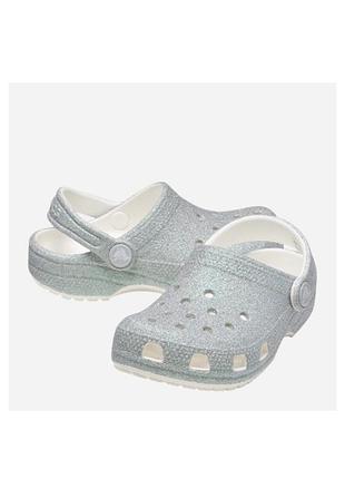 Подростковые кроксы-сабо для девочки crocs classic iridescent glitter clog kids серебристые p.33-34 ст.21 см