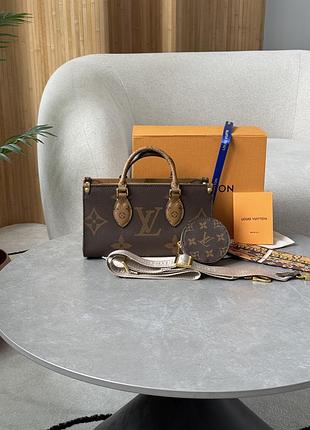 Сумка onthego east west monogram reverse canvas