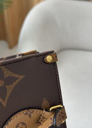 Сумка onthego east west monogram reverse canvas 5