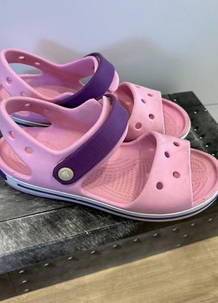 Босоніжки для дітей crocs j1 рожеві з фіолетовим