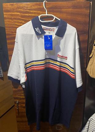 Чоловіче поло reebok athletic department біле та темно-синє з горизонтальними смужками