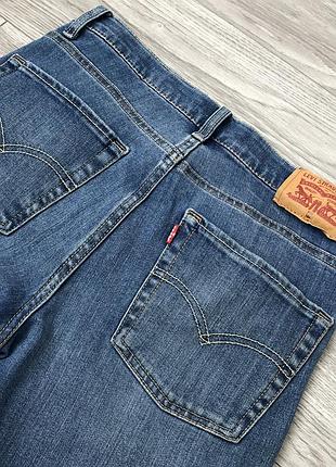Сині джинси levi's.