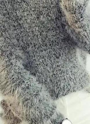 Светр є пухнастим 22-23.