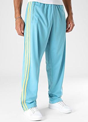 Спортивні штани чоловічі adidas originals firebird блакитно жовті