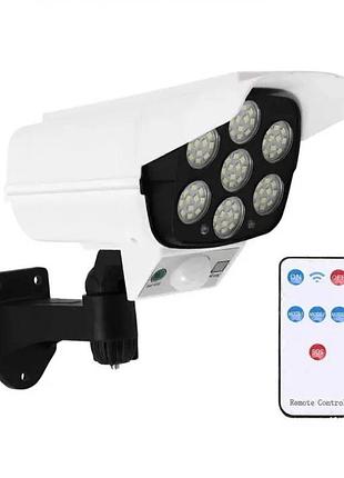 Ліхтар вуличний 77 cob led з датчиком руху, сонячною батареєю та пультом. світильник для двору у вигляді камери відеоспостереження