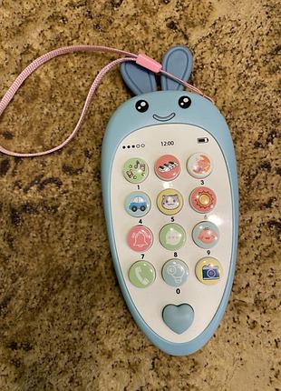 Детская интерактивная музыкальная игрушка- мобильный телефон