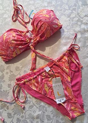 Яркий розовый раздельный купальник бренда primark с тропическим принтом