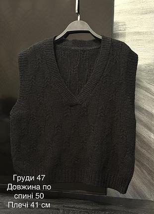 Жіночий чорний вʼязаний жилет