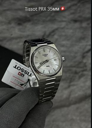 Жіночий годинник  tissot prx 35 mm t137.210.11.111.00 сріблястий з перламутровим циферблатом
