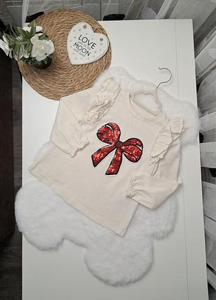 Молочний лонгслів з бантиком в паєтках від matalan 2-3 роки (92-98) реглан