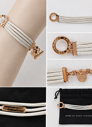 Брендовый браслет marc jacobs.оригинал.прмезено щиспании 
нат кожа + бижут сплав в чехле