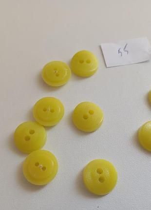 55. ґудзики жовті 9 шт