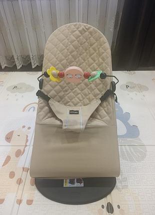 Заколисуючий центр та шезлонг дитячий