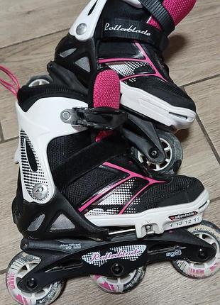 Качественные раздвижные ролики rollerblade (28-32 размер) для девочки.