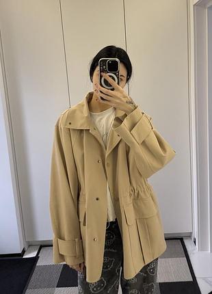 Утеплена куртка на затяжках від бренду favorite style.
