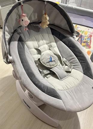 Заколисуючий центр caretero