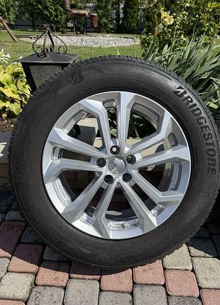 Легкосплавні диски dezent з шинами bridgestone blizzak lm005