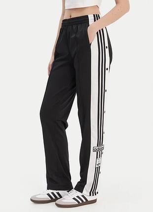 Спортивні штани жіночі adidas чорні з білими смужками